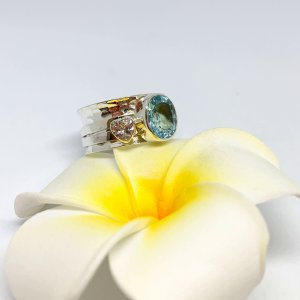 Topaz+heart mechanical ring
