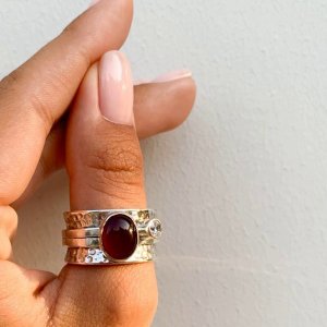 Ring with garnet and zircon
