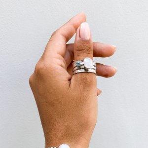 Moonstone and topaz mechanical ring