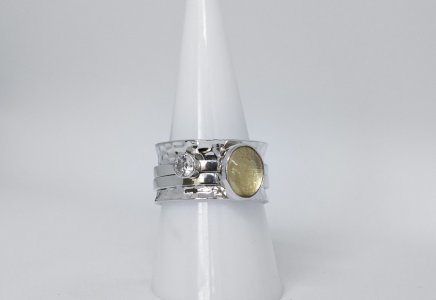 Mechanical ring with citrine and zircon